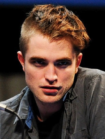 Robert Pattinson capelli rossi rasati