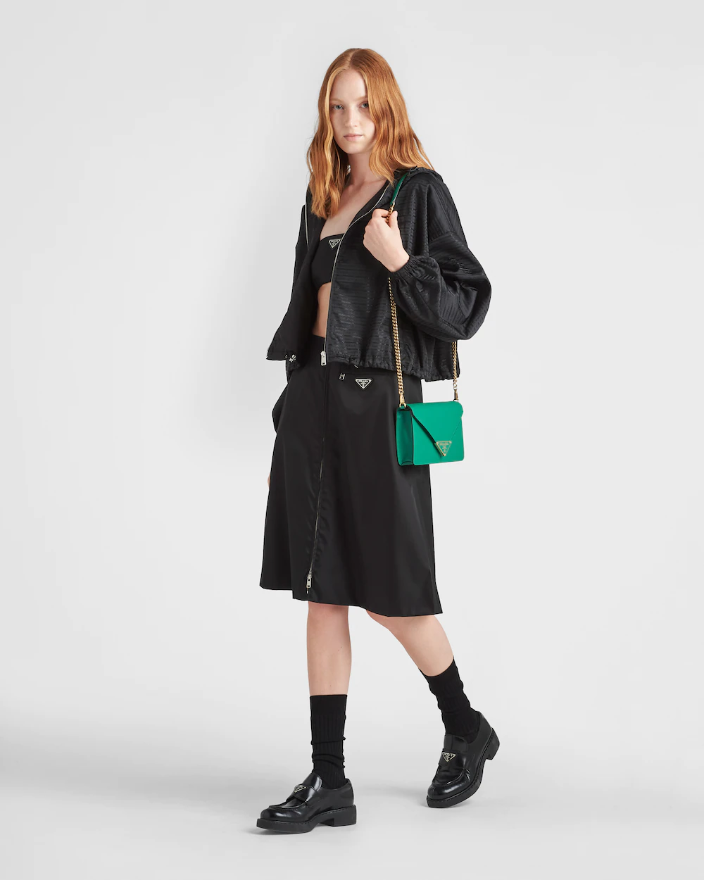 Piccola borsa con tracollino di colore verde di Prada