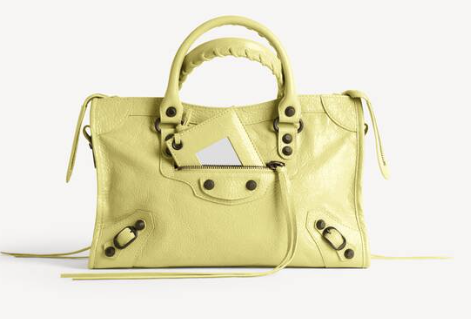 Balenciaga City bag in pale yellow lambskin with a braided top handle and studded brass hardware