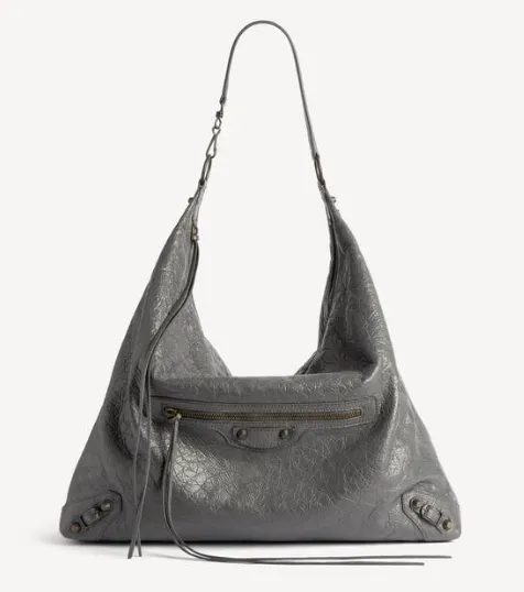 Balenciaga hobo-style bag in grey distressed leather with brass studs and a zip-pull tassel