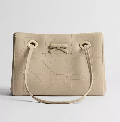 Borsa Dior in pelle beige con motivo Cannage, coulisse negli occhielli e fiocco in pelle