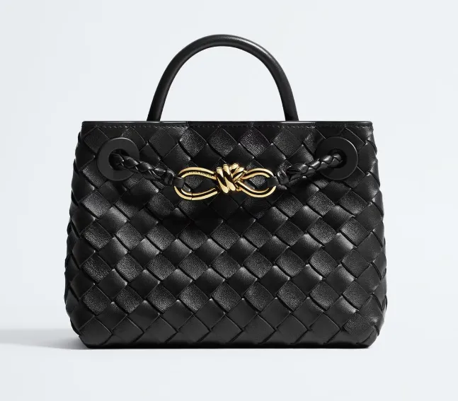 Bottega Veneta black intrecciato leather tote with a gold knot detail