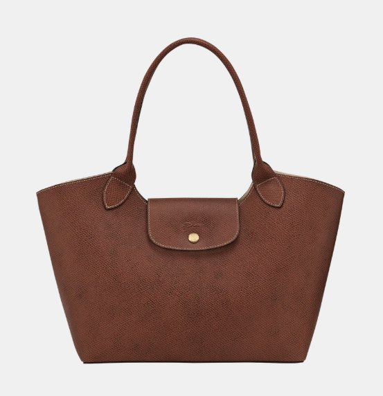 Brown Longchamp tote in Russie leather with the diamond grain visible on the flap, handles and body