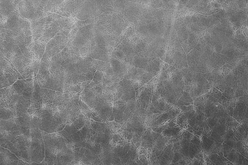 Leather bag surface covered in fine scratches
